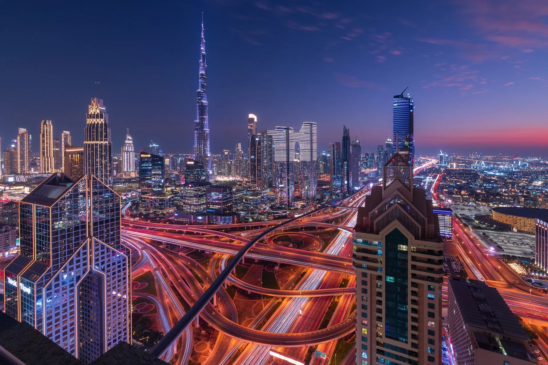 Business Bay and Downtown Dubai skyline at twilight